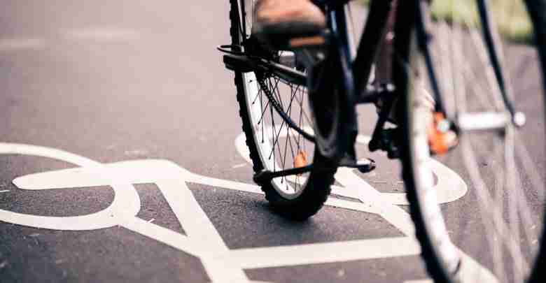 City Bicycle Riding On Bike Path