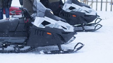Bigstock Snowmobile Snowmobiling In Win 445358666 390x220