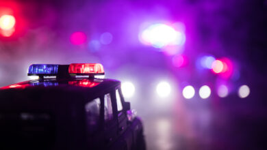 Bigstock Police Cars At Night Police C 412475434 390x220