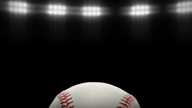 Bigstock Baseball Ball On A Black Backg 463189559 390x220