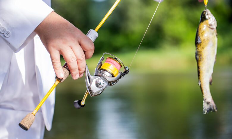 Bigstock Man Hold Big Fish Trout In His 453328217 6042045 6313348 4399194 2727722 1715123 780x470