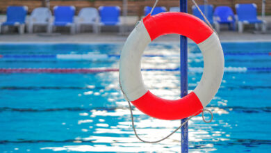 Bigstock Life Ring On Swimming Pool Bac 459292977 390x220