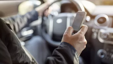 Bigstock Using A Phone In A Car Texting 155269526 Jpg 390x220