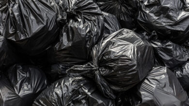 Bigstock Background Garbage Bag Black B 244110202 Scaled 390x220