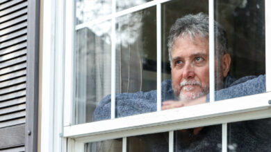 Bigstock Senior Man Inside Looking Out 363079747 390x220