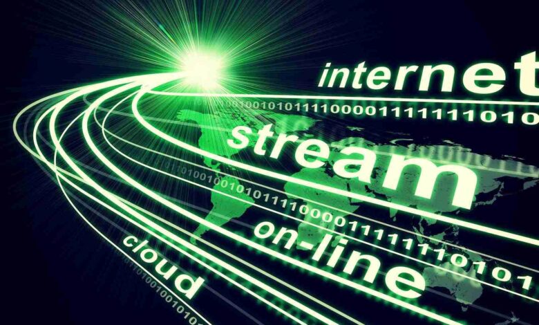 Earth, continents, light beams, digits and words like internet,
