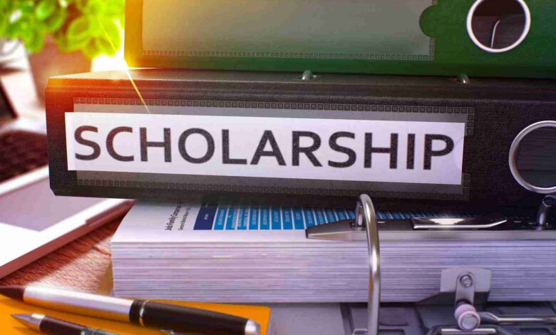 Scholarship on Black Office Folder. Toned Image.