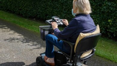 Bigstock An Elderly Lady In A Blue Coat 387444559 390x220