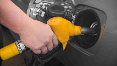 Pumping Gas At Gas Pump.