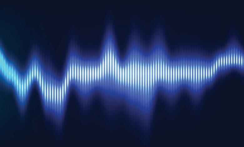abstract,sound,wave,or,equalizer,background,with,glowing,blue,lines,